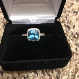 Absolutely stunning Blue Topaz and Diamond ring!